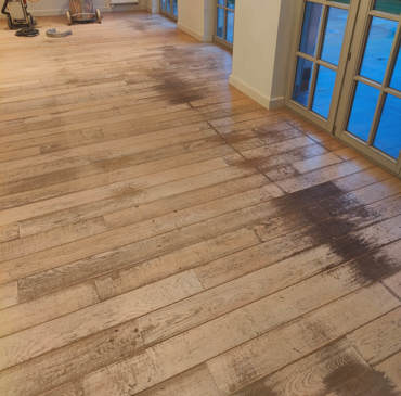 Een plankenvloer werd aangepakt in Schilde